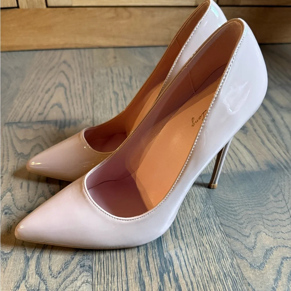 Worn once Elizabet Lang classic statement nude patent leather 4 inch heel shoes.